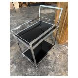 Rollling cart with black glass shelves