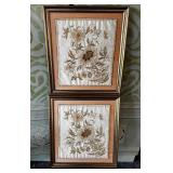 Pair of framed silk art pieces.
