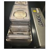 Circa 1923's BOX of SLABBED GRADED MS 62 and 63s