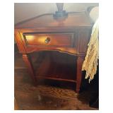 A pair of solid wood lamp tables