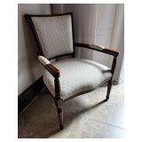 Chair with cream cushion