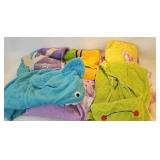 8 children sized hoody towels with themes