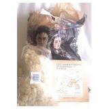 Bag of wool and spinning book