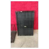 Two dog crates, medium, and large