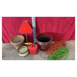 Flower pots, SMV sign extension cords gas can