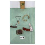 Pocket knives, tie bar, belt buckle