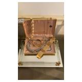 Four necklaces a womenï¿½s watch ,decorative mirror