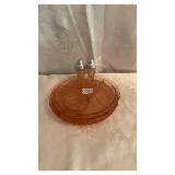 Three divided pink depression, plates, and salt