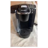 Keurig and misc coffee pot and plates