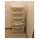 Two plastic three drawer storage containers