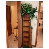 Decorative shelf unit with greenery