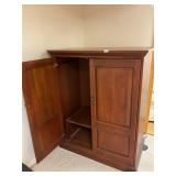 Entertainment center doors slide