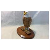 Wooden carved eagle by Norris Cromes