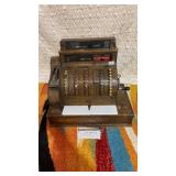 National cash register, broke glass and marble