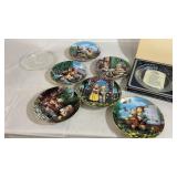 Assorted Hummel plates and global crystal plates