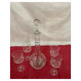 Wine carafe and four wine glasses