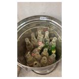 Tin of pop bottles