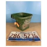 Handy green seeder and license plate