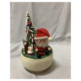 7" tall vintage music box. Plays Santa Claus is