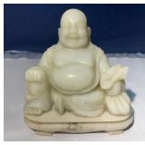 Vintage marble-like stone Buddha