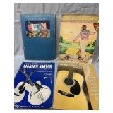 4 guitar music books. Two are Elton John