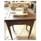 Vintage New Home Sewing Machine, tested and works