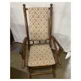 Wooden spring rocking chair with upholstered back