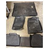 4 Husky heavy duty plastic floor mats