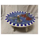 8" tall and 13" wide. Stained glass wood bench