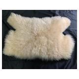 19 inches  x 13 inches New Zealand wool rug