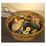 Beautiful antique sewing items in basket