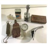 Vintage tins, broom, scale, gauge, gas nozzle,