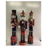 24" tall nutcrackers. One on the left is missing