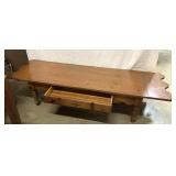 Drop leave coffee table. 63 inches with both