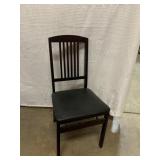 Folding Wood chair with vinyl seat. 36? tall at