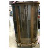 57 inch tall curved glass display case with three