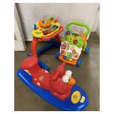 One Sesame Street Elmo riding toy, and 2, VTech