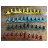 Vintage NEVER REMOVED plastic token pieces