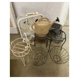 Household fan, numerous plant stands, stepping