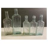 Antique medicine bottle -tallest one is 9 1/2"