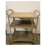 Vintage metal serving bulter on castors