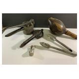 Large vintage fruit press, tongs and 12" lidded