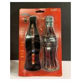 1996 ceramic pen in tin and 1994 grab the bottle