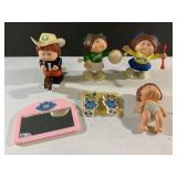 Three 3-1/2" wind up Cabbage Patch toys
