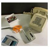 Vintage push-button phone, tacks, scissor, more