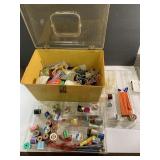 Vintage plastic sewing box and contents-box has a