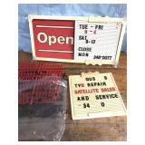Open sign with letters