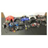 Tons of gaming controllers, for various gaming