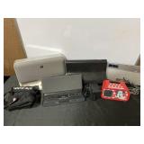 Speakers, radios and a game boy carrying case,