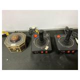 2 Atari controllers and a Pirates of the